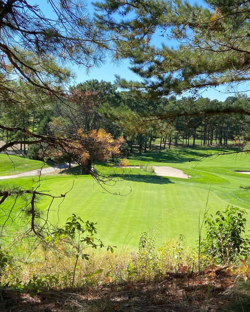 Bunker on golf course near cart path 